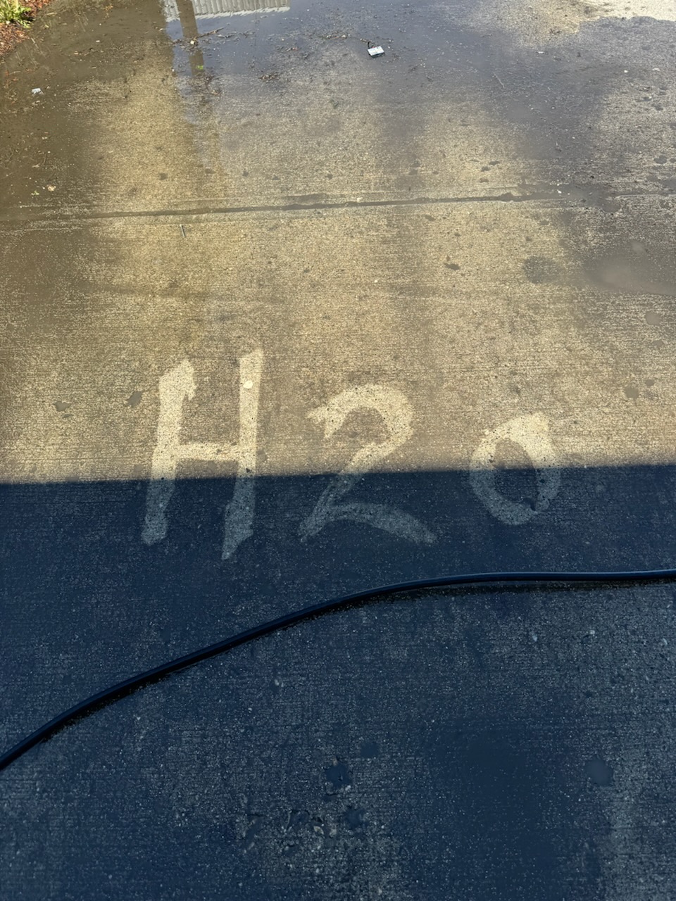 Before pressure washing, stained dirty surface
